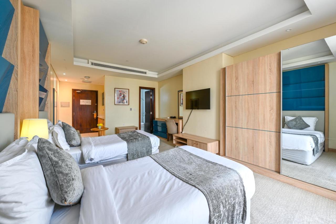 Al Mansour Suites Hotel Doha Bagian luar foto