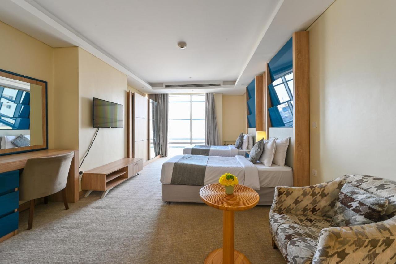 Al Mansour Suites Hotel Doha Bagian luar foto