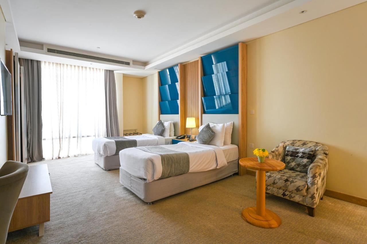 Al Mansour Suites Hotel Doha Bagian luar foto