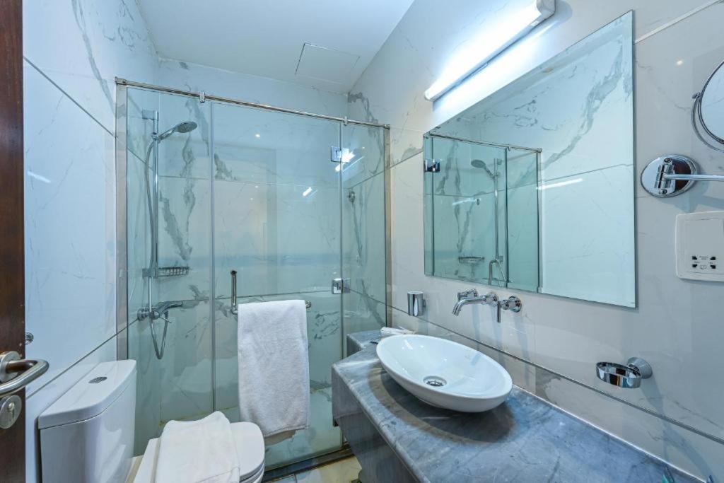 Al Mansour Suites Hotel Doha Bagian luar foto