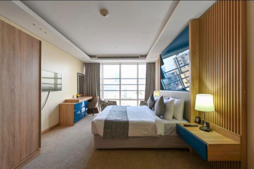Al Mansour Suites Hotel Doha Bagian luar foto